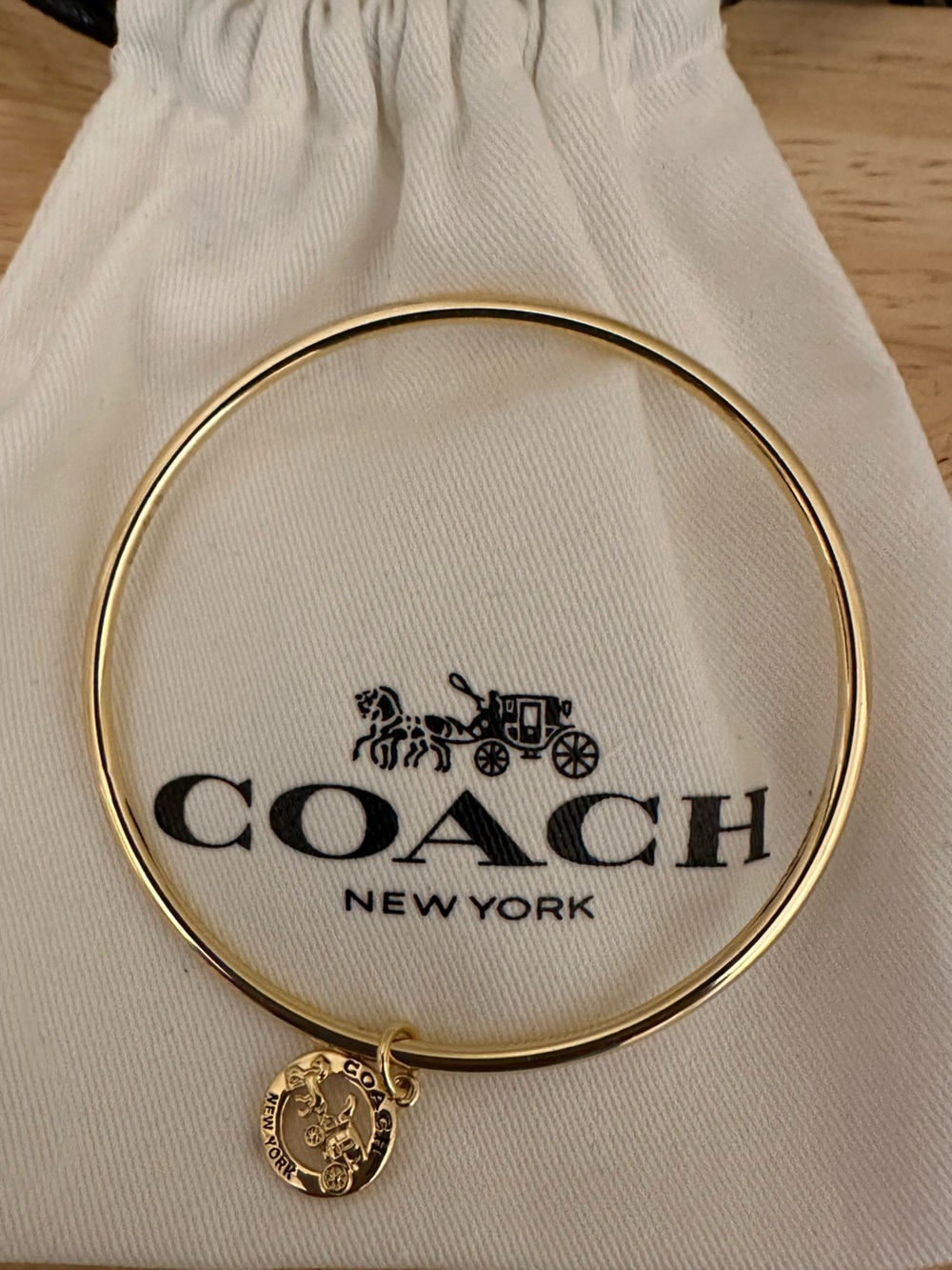 Coach Gold Tone Bangle Bracelet with Coach Charm